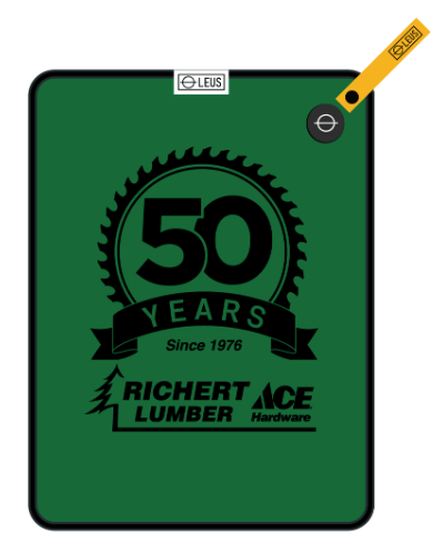 Two green pads with '50 Years' and 'Richert Lumber' branding on a white background.