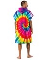 Man wearing a colorful tie-dye hoodie on a white background