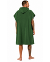 Person wearing a green hooded towel on a white background