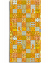Patterned towel with a colorful patchwork design on a white background