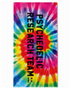 A rectangular beach towel featuring a vibrant rainbow tie-dye spiral pattern with bold black vertical text reading 'PSYCHEDELIC RESEARCH TEAM' on the front.