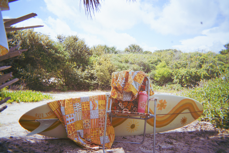 Patterned towel with a colorful patchwork design on a white background